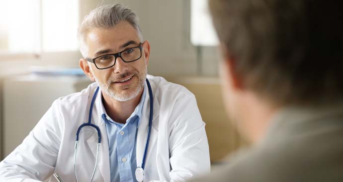 male weight loss doctor talking  with a patient during a weight loss consultation